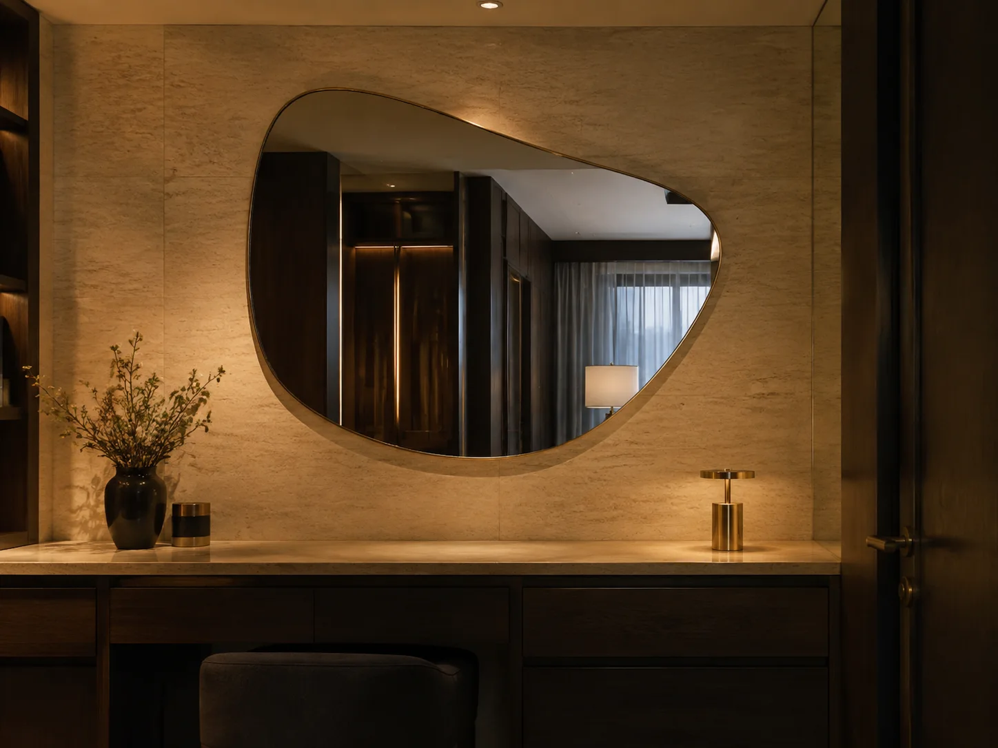 Large freeform custom shaped mirror in a luxury hotel suite