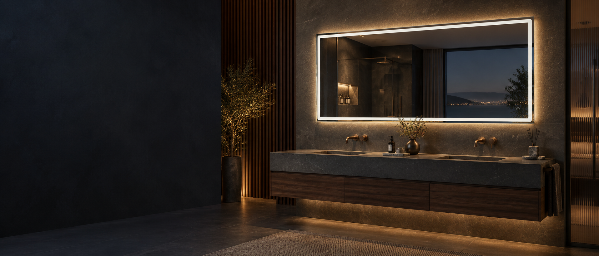 Illuminated bathroom mirror in a modern hospitality interior