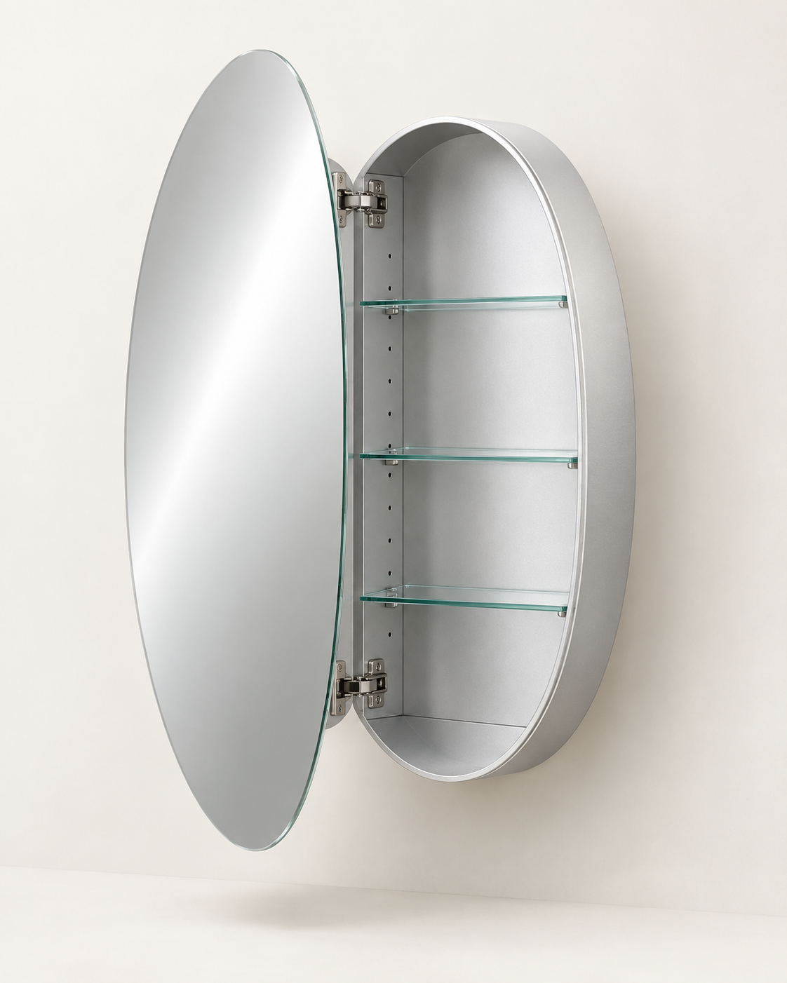 Complete frameless oval medicine cabinet with polished glass edge, silver body and adjustable shelves