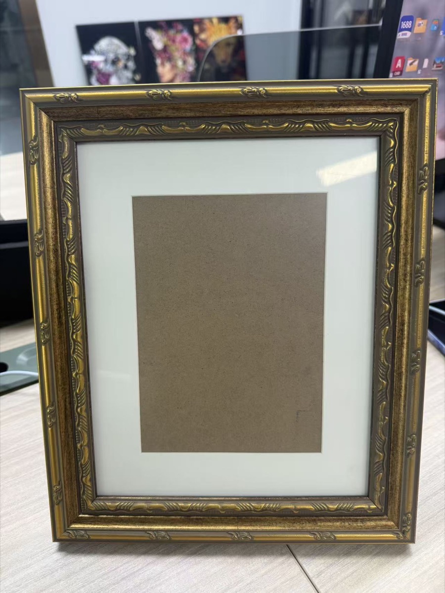 Narrow classical gold and brown frame assembly