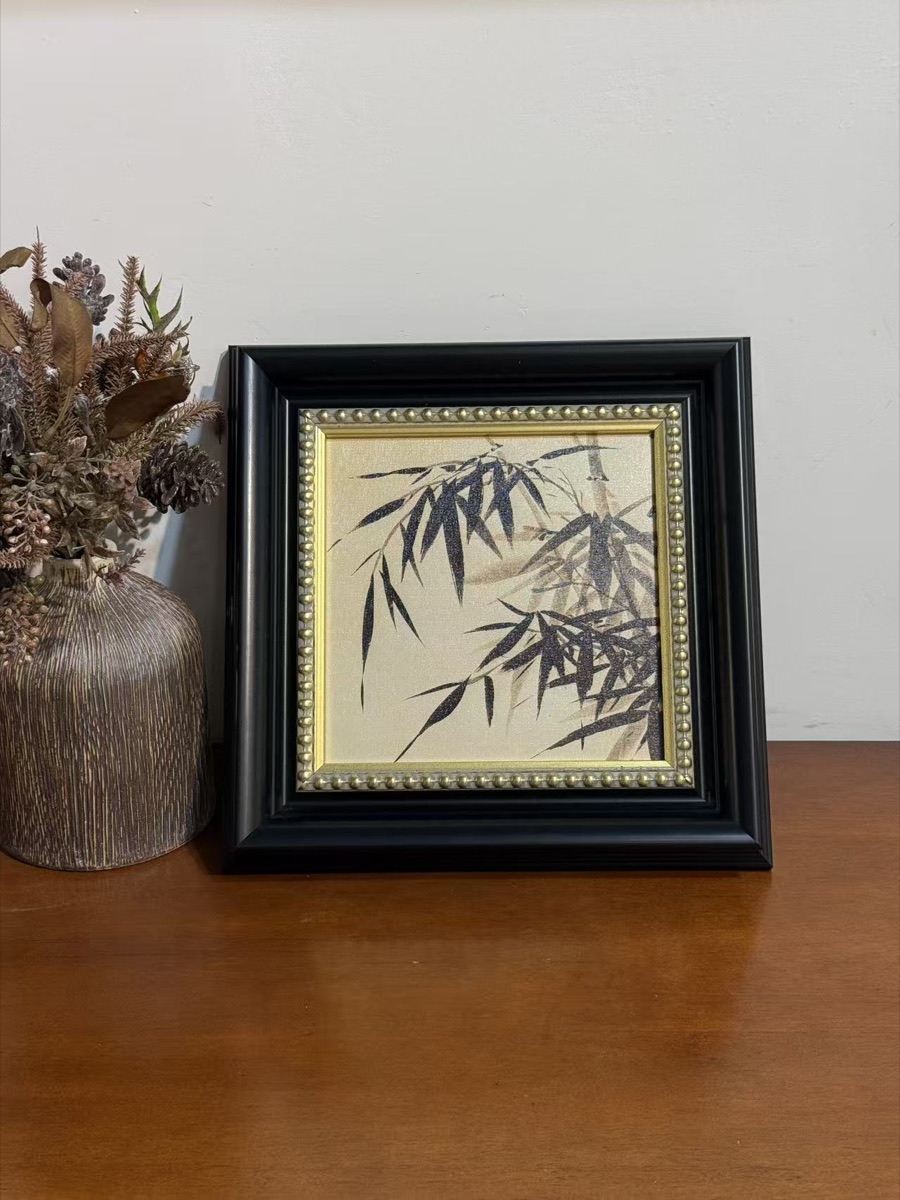 Black bevel frame with gold bead trim