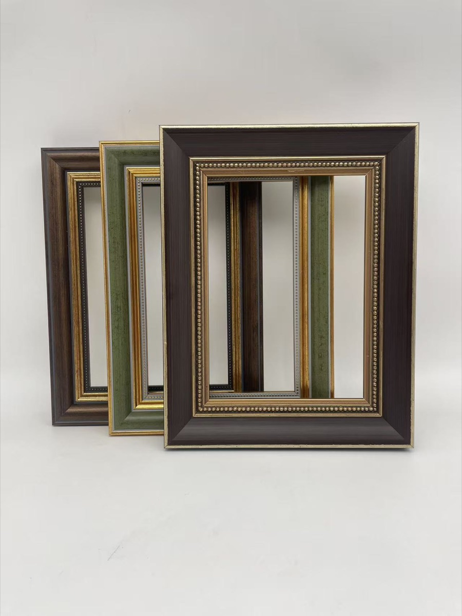 Physical wood grain green and dark frame samples with gold inner trim