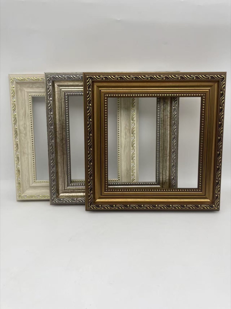 Physical white silver and antique gold decorative frame samples