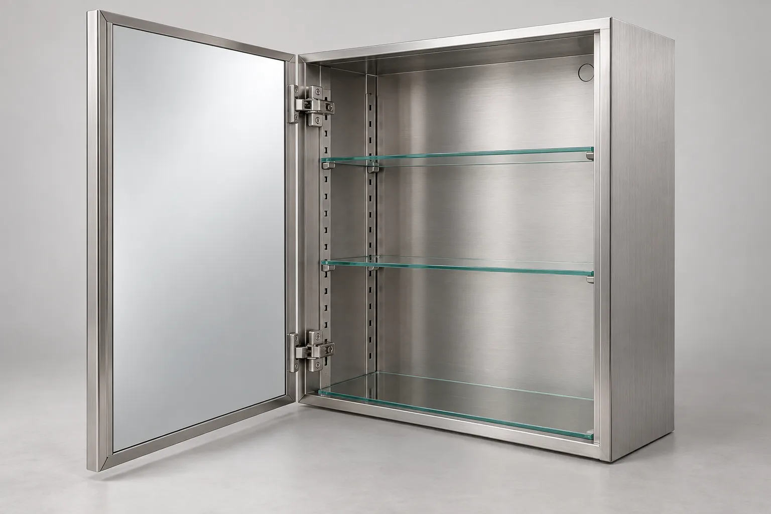 Open stainless steel mirrored medicine cabinet showing hinge hardware, folded edges, adjustable shelf supports and glass shelves