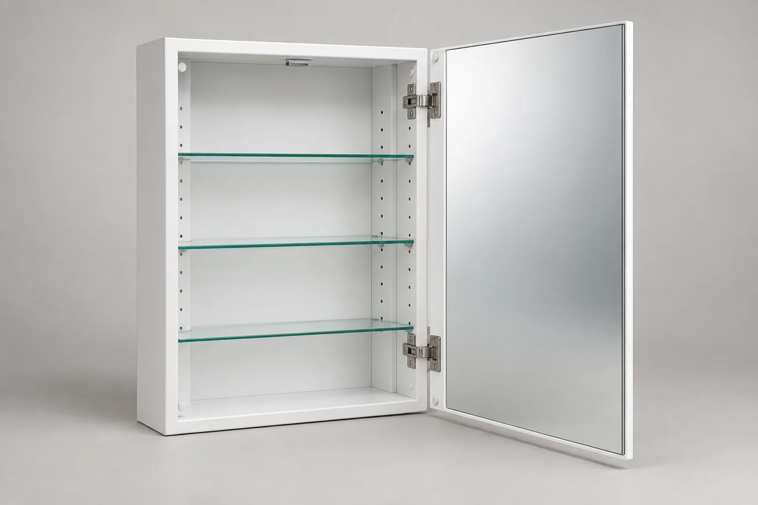 Complete open white powder-coated steel medicine cabinet showing three glass shelves, adjustable shelf holes, concealed hinges and a mirrored door carrier