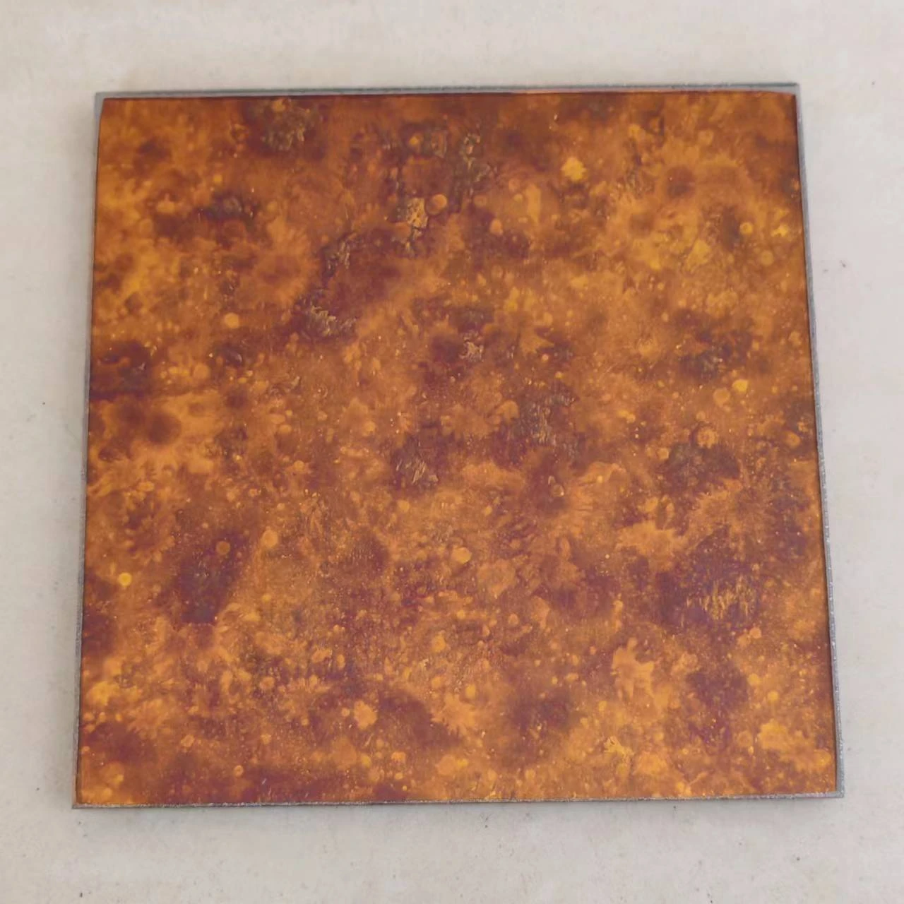 AMG-02 Aged Bronze Mottle, actual OJMirror finish sample